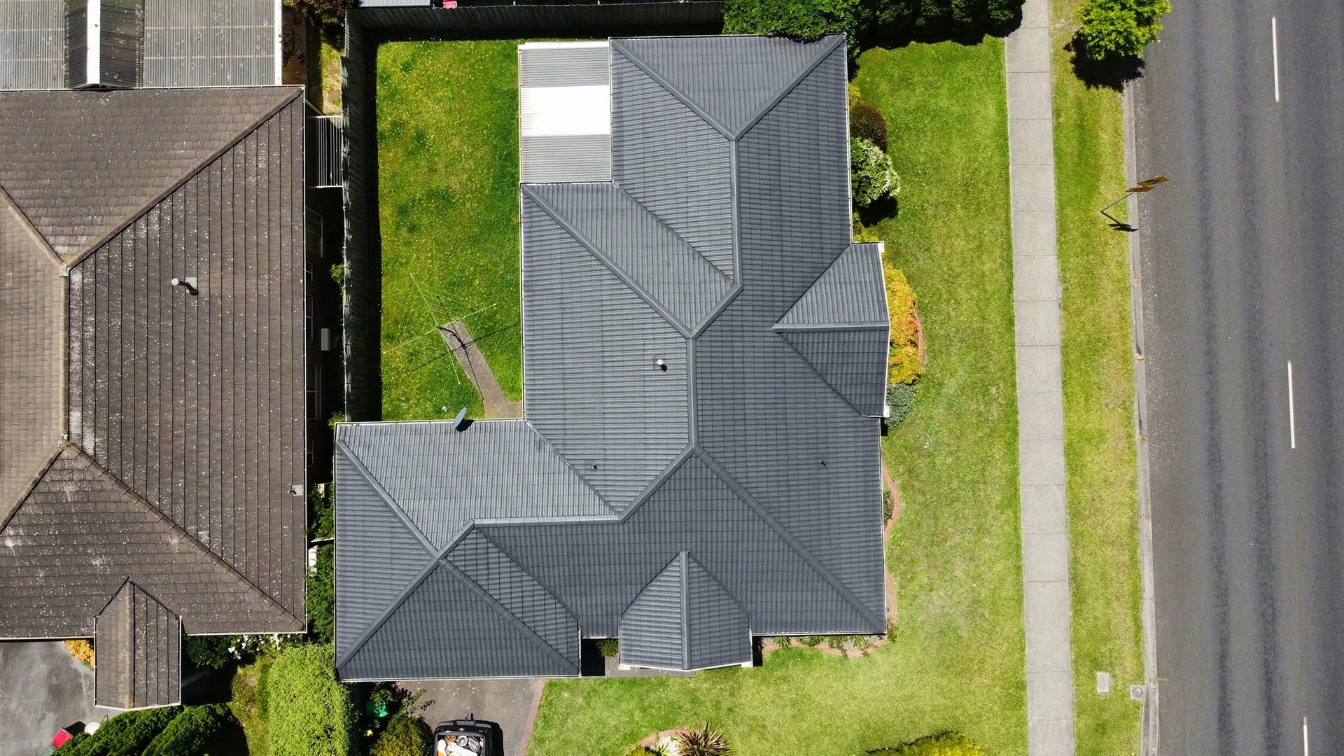 Aerial view of the same concrete tile roof restored in Monument
