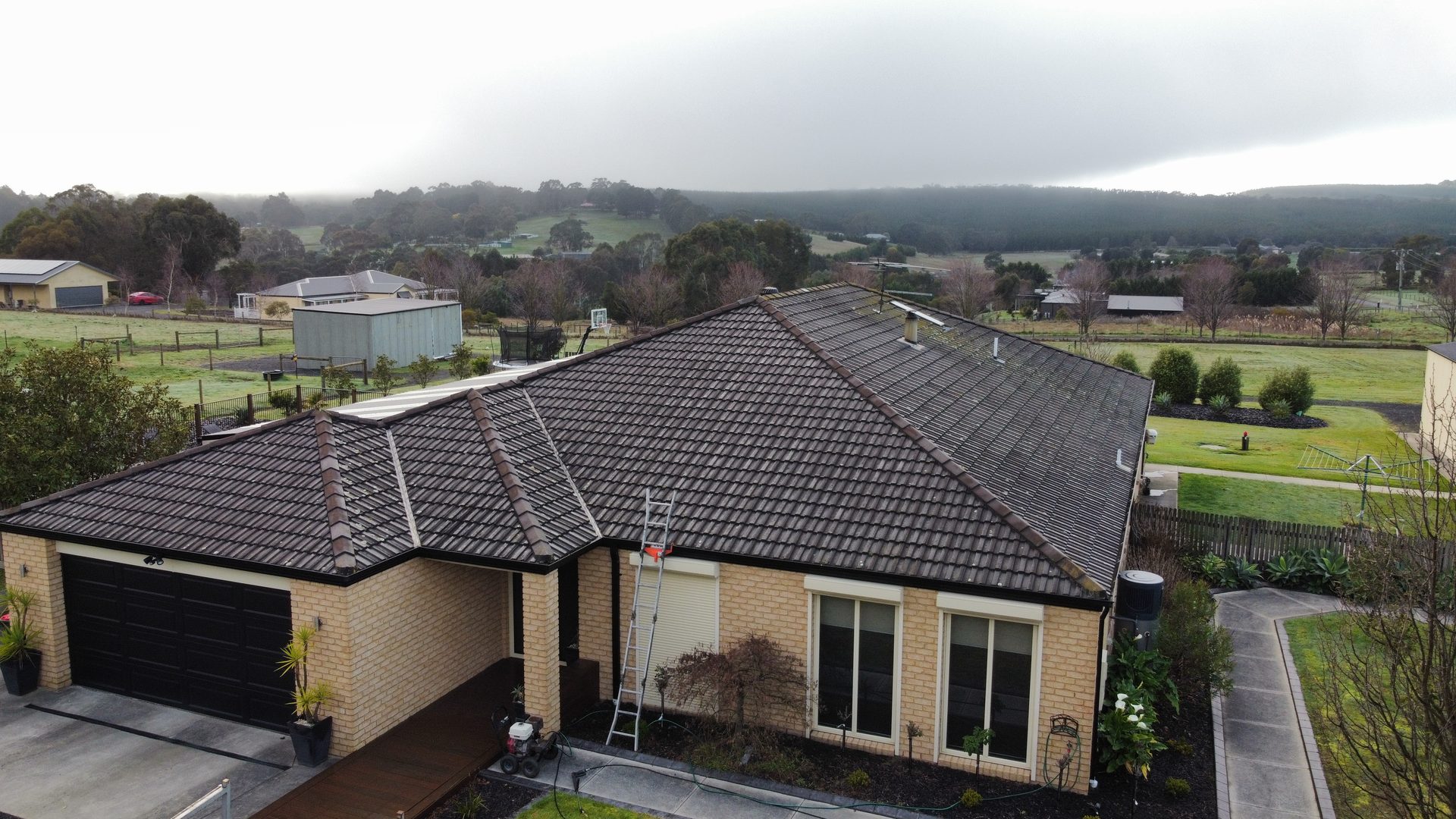 Charcoal concrete tile restoration