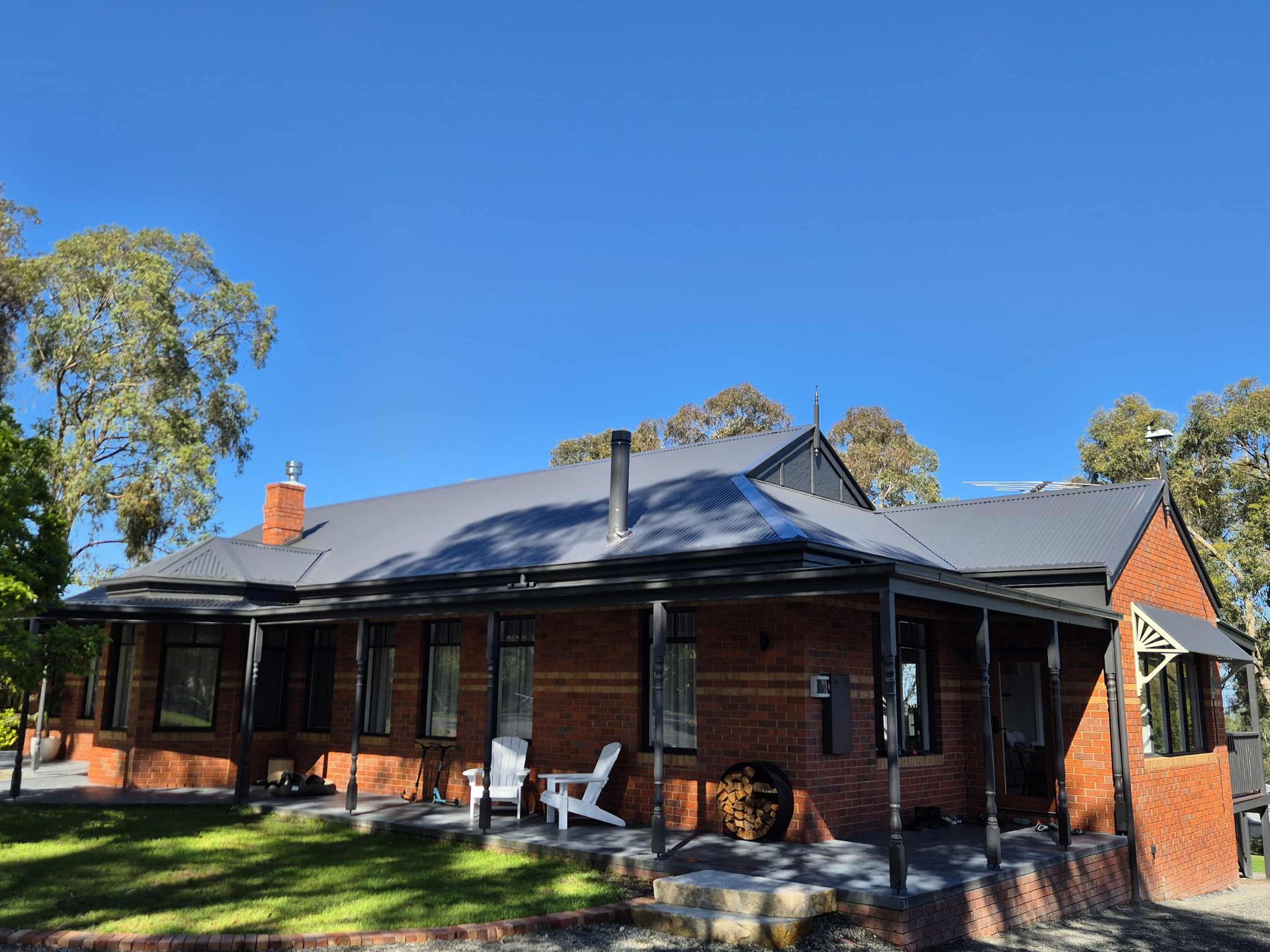 Same home restored in Monument charcoal Colorbond